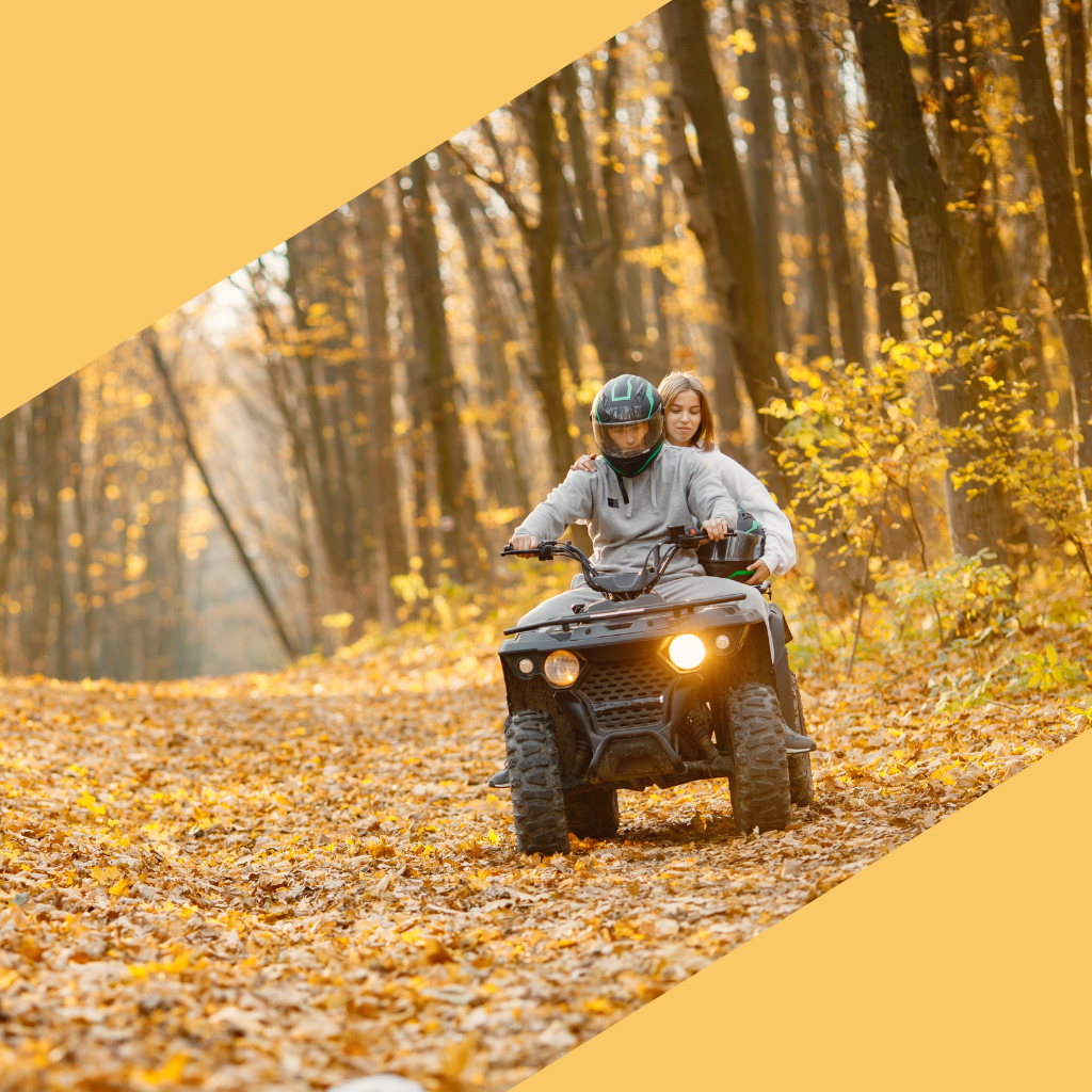 ATV riders enjoying the Paiute ATV Trail in Utah during colorful fall season.