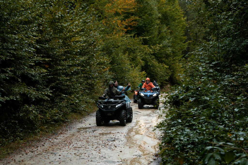 two people riding in ATV